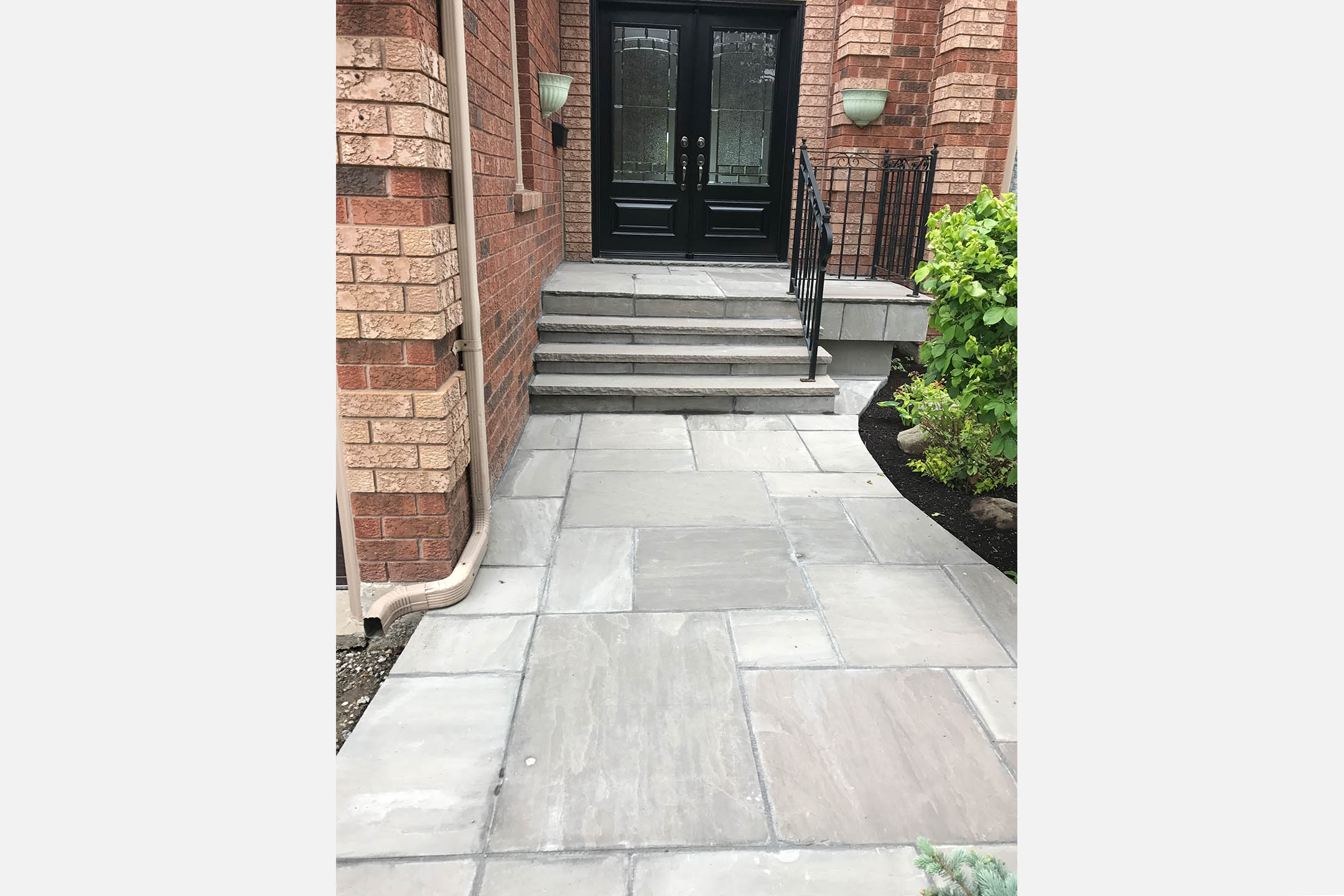 Q.E.W. Contracting Flagstone